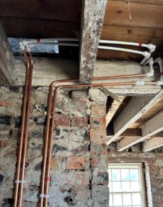 Copper and barrier pipe used together in central heating installation